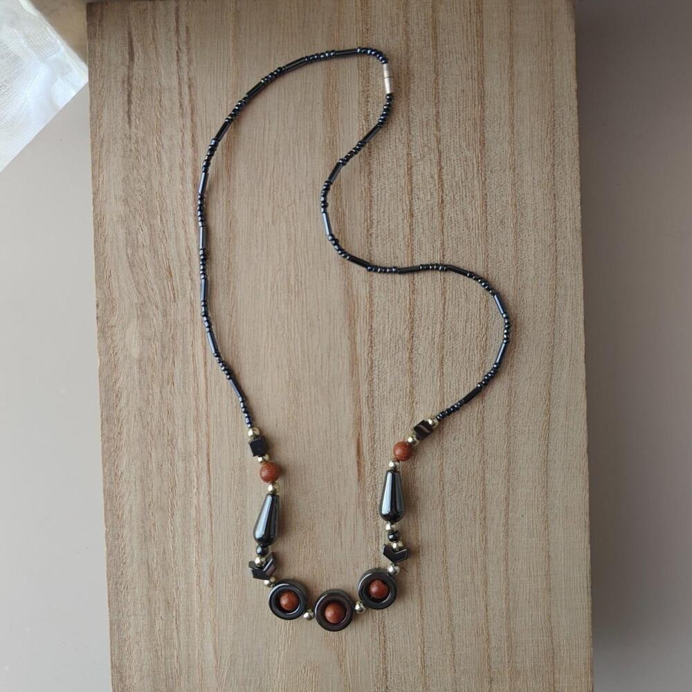 Bohemian faux hematite and goldstone geometric beaded necklace